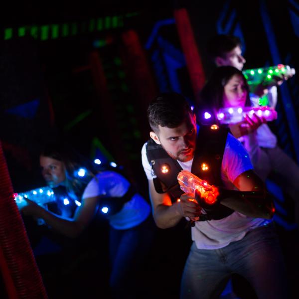 Laser tag student and adults at Cardigan Fields
